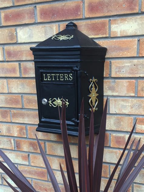 antique post box wall mounted